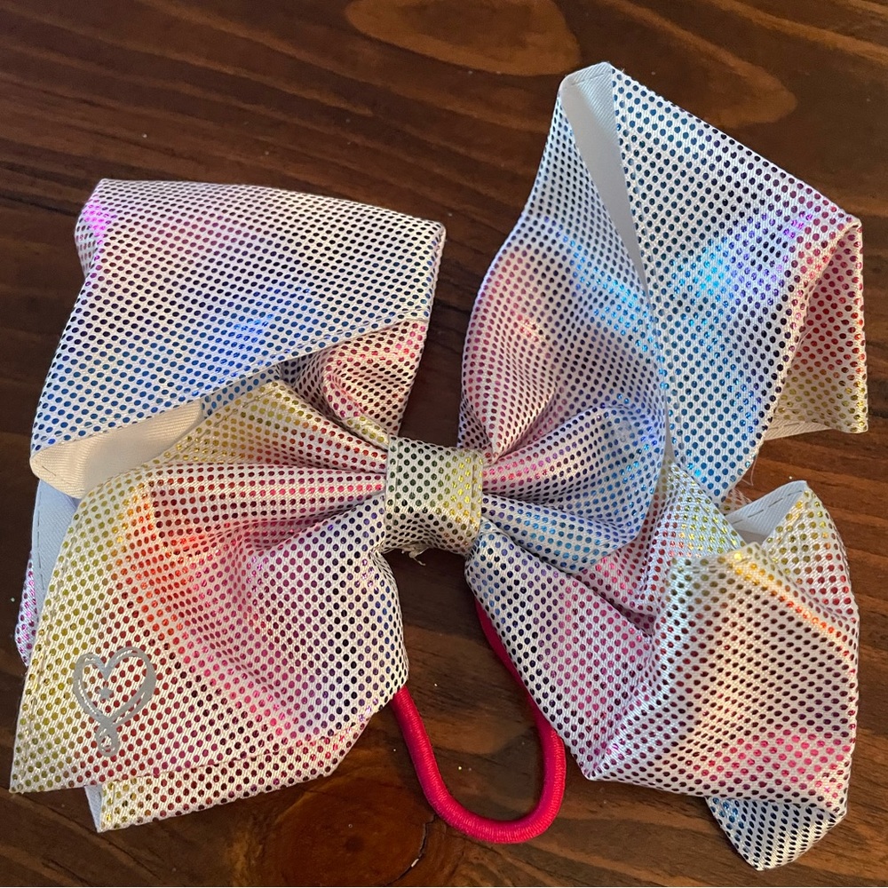 Jojo Siwa signature collection Cotton Candy colors Bow pony tail holder.